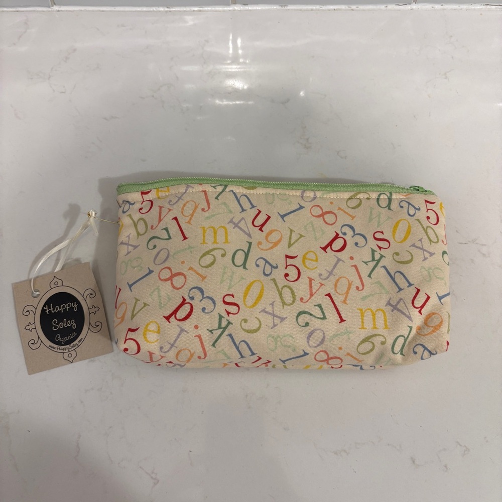 NWT Alphabet Print Zip Pouch in Cream with Multicolor Letters